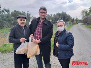 Burhaniyeli muhtarlar 65 yaş üstü vatandaşların yardımına koştu